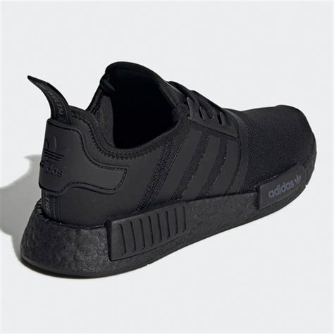 adidas nmd r1 primeknit schwarz weiße schrift|Adidas NMD r1 primeknit shoes.